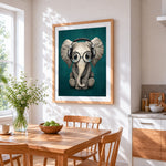 Cute baby elephant with headphones cross stitch artwork displayed on wall as home decor