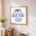 Cute baby elephant with star cross stitch artwork displayed on wall as home decor