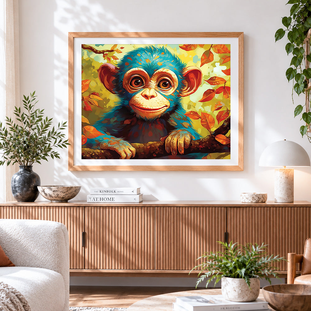 Finished cute baby monkey in autumn leaves cross stitch artwork displayed