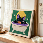 Cute bat taking bath punch needle artwork displayed on a table
