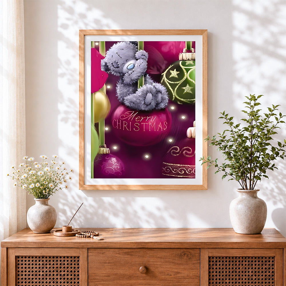 Finished cute bear on a bauble cross stitch artwork displayed
