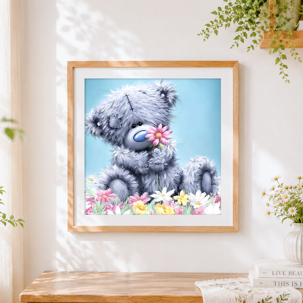 Finished cute bear with pink flowers paint by numbers artwork displayed as home decor