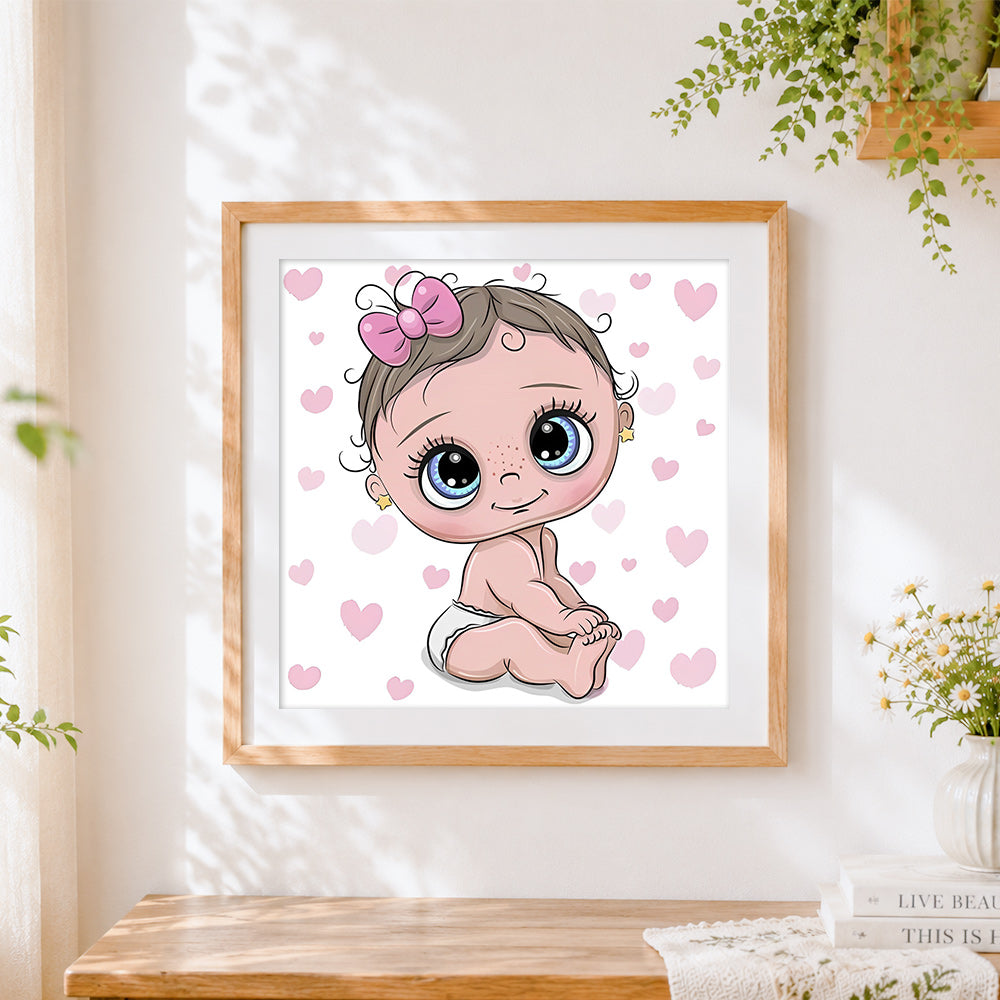 Finished cute cartoon baby girl with pink hearts cross stitch artwork displayed