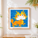 Finished cute cartoon chinese dragon cross stitch artwork displayed
