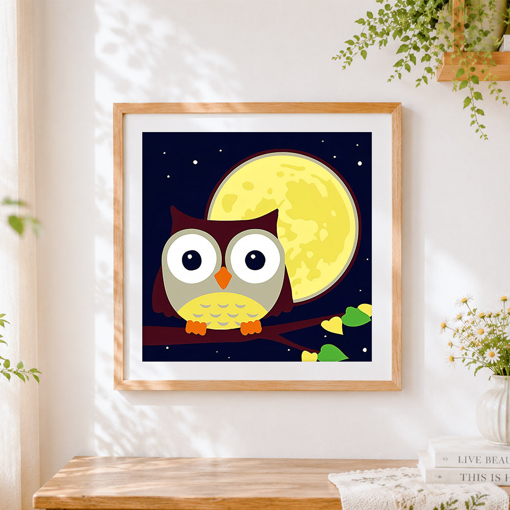 Finished cute cartoon owl and full moon cross stitch artwork displayed
