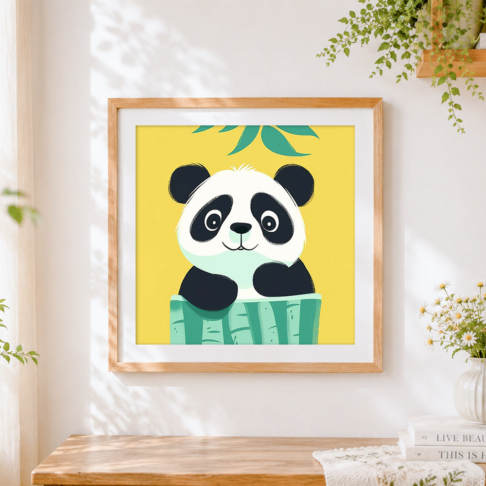 Finished cute cartoon panda peeking over bamboo cross stitch artwork displayed