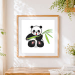 Finished cute cartoon panda with bamboo cross stitch artwork displayed