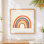 Finished cute cartoon rainbow cross stitch artwork displayed