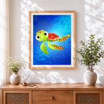 Finished cute cartoon sea turtle cross stitch artwork displayed