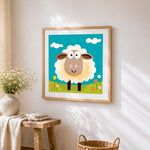 Cute cartoon sheep cross stitch artwork displayed on wall as home decor