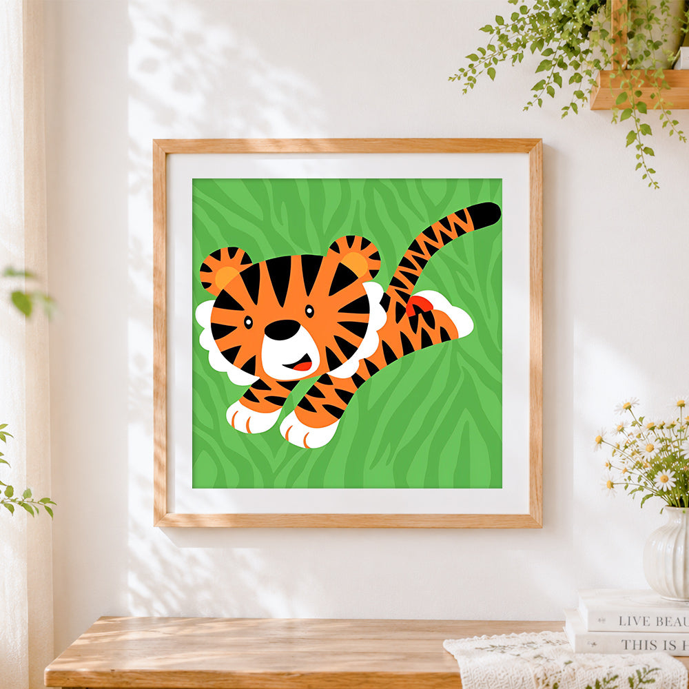Finished cute cartoon tiger cub cross stitch artwork displayed