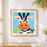 Finished cute cartoon zebra with orange nose cross stitch artwork displayed