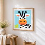 Cute cartoon zebra with orange nose cross stitch artwork displayed on wall as home decor