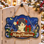 Cute cat with christmas gift paint by numbers door hanger on a garden gate
