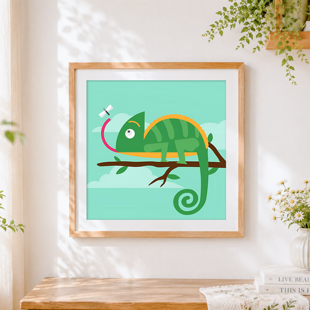 Finished cute chameleon catching a fly cross stitch artwork displayed
