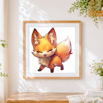 Finished cute chibi fox winking cross stitch artwork displayed