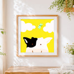 Finished cute cow and dragonfly cross stitch artwork displayed