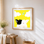 Cute cow and dragonfly cross stitch artwork displayed on wall as home decor