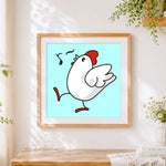 Finished cute dancing chicken with music notes cross stitch artwork displayed