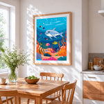 Cute dolphin and colourful fish cross stitch artwork displayed on wall as home decor