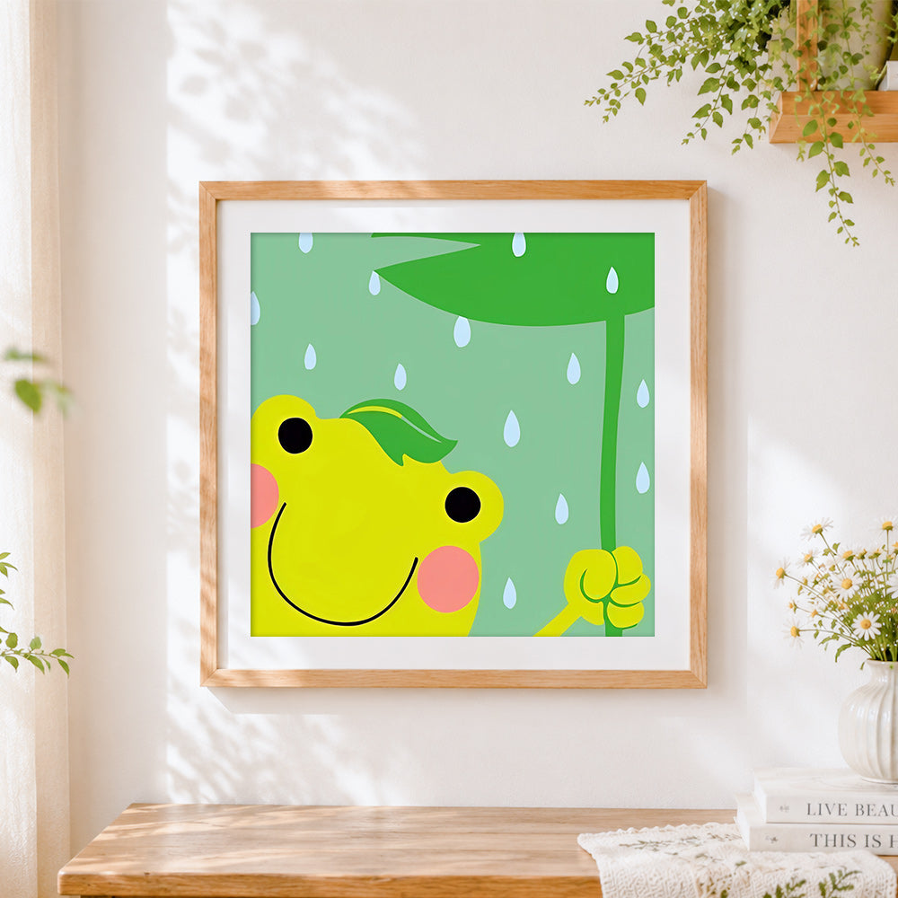 Finished cute frog holding leaf in rain cross stitch artwork displayed