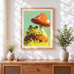 Finished cute frog on a toadstool cross stitch artwork displayed