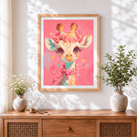 Finished cute giraffe with a pink floral crown cross stitch artwork displayed