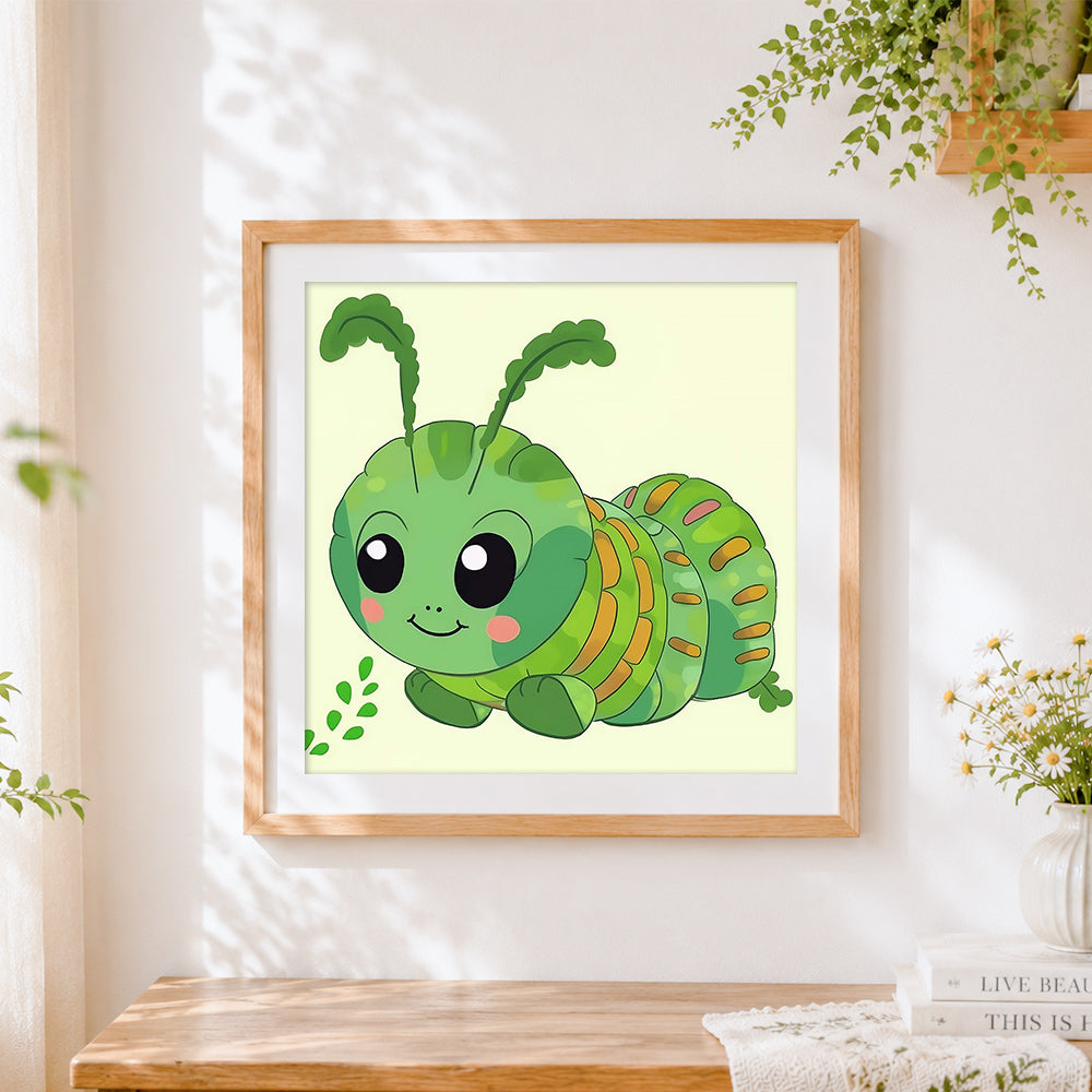 Finished cute green caterpillar cross stitch artwork displayed