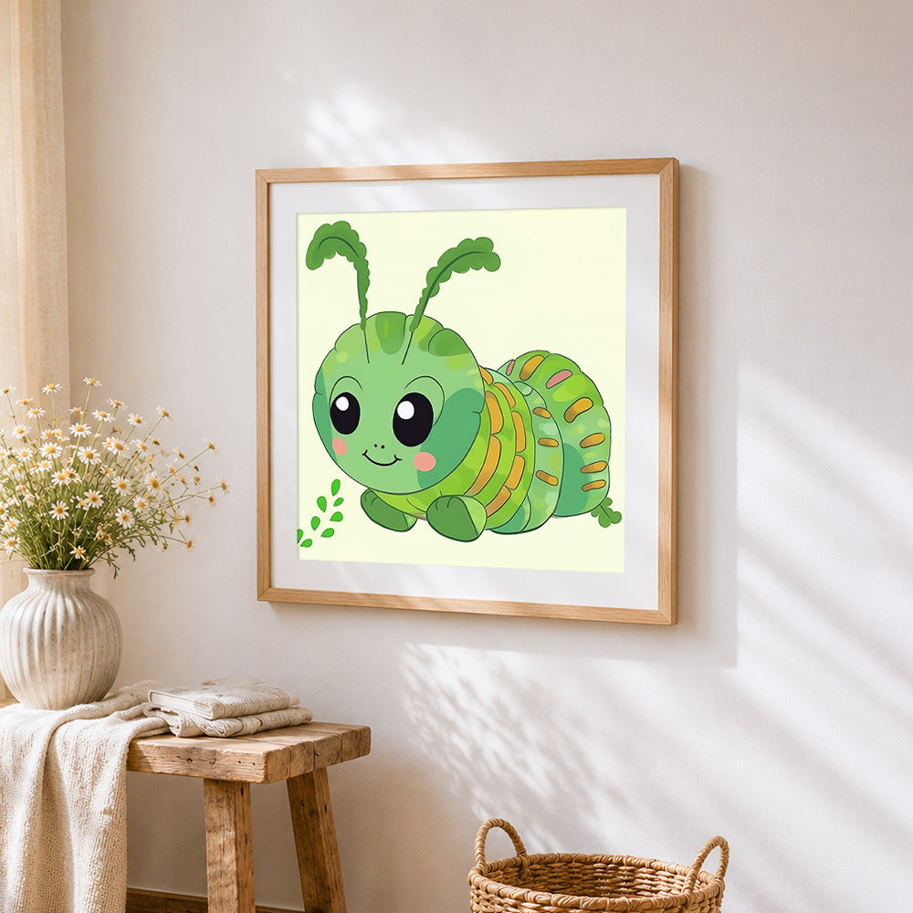 Cute green caterpillar cross stitch artwork displayed on wall as home decor