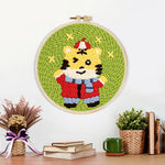 Finished cute happy tiger artwork displayed on a wall