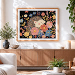 Finished cute hedgehog in a floral garden cross stitch artwork displayed