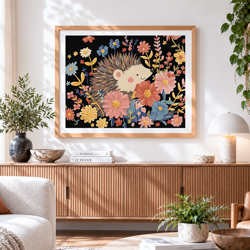 Finished cute hedgehog in a floral garden cross stitch artwork displayed