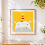 Finished cute hippo with party hat cross stitch artwork displayed