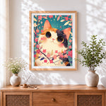 Finished cute kawaii cat in blossoms cross stitch artwork displayed