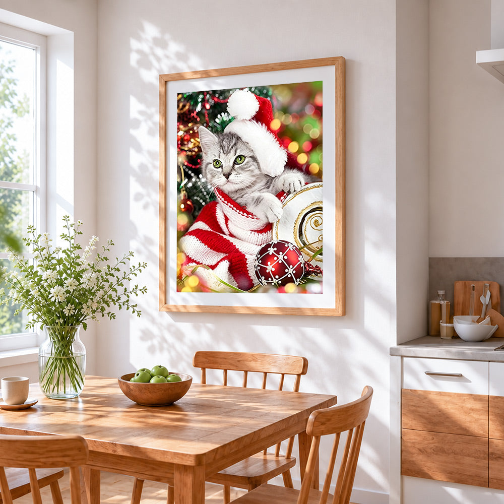 Cute kitten in santa hat and jumper cross stitch artwork displayed on wall as home decor