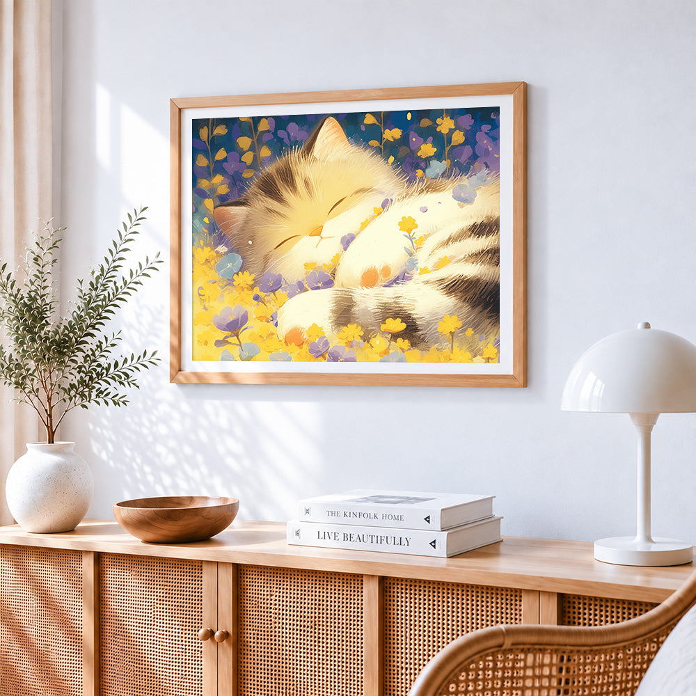 Cute kitten sleeping in a flower bed paint by numbers artwork displayed on wall as home decor