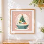 Finished cute kittens in a christmas snow globe cross stitch artwork displayed