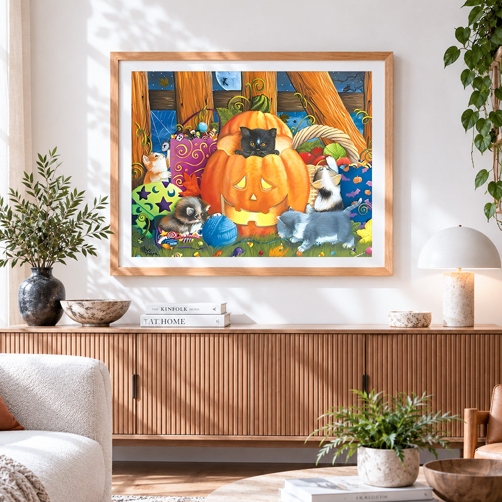 Finished cute kittens in a pumpkin patch cross stitch artwork displayed