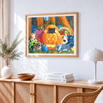 Cute kittens in a pumpkin patch cross stitch artwork displayed on wall as home decor