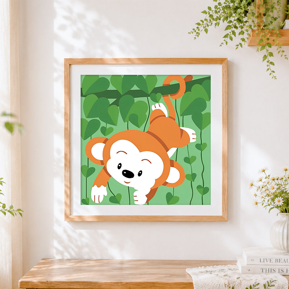 Finished cute monkey hanging from a vine cross stitch artwork displayed