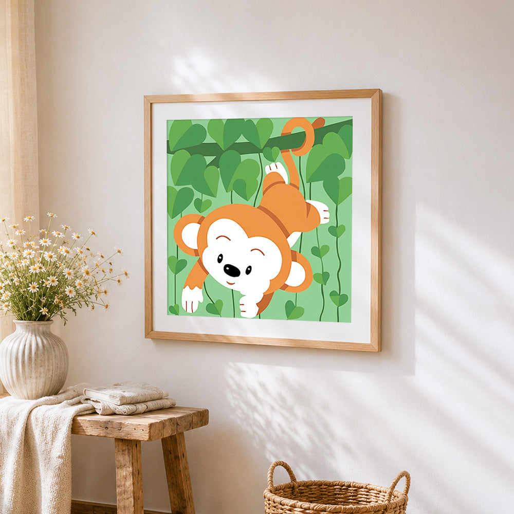 Cute monkey hanging from a vine cross stitch artwork displayed on wall as home decor