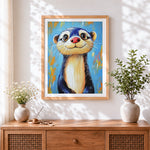 Finished cute otter portrait in blue cross stitch artwork displayed