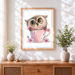 Finished cute owl in floral teacup cross stitch artwork displayed