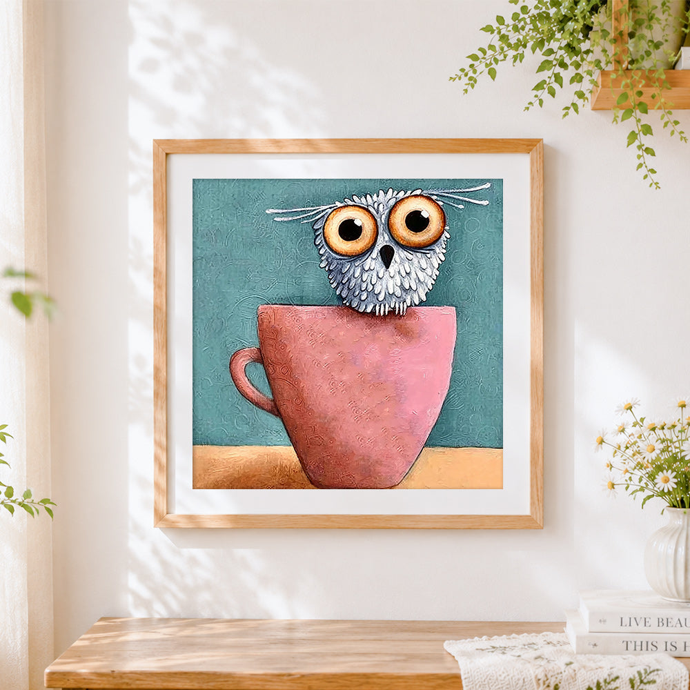 Finished cute owl in pink teacup cross stitch artwork displayed