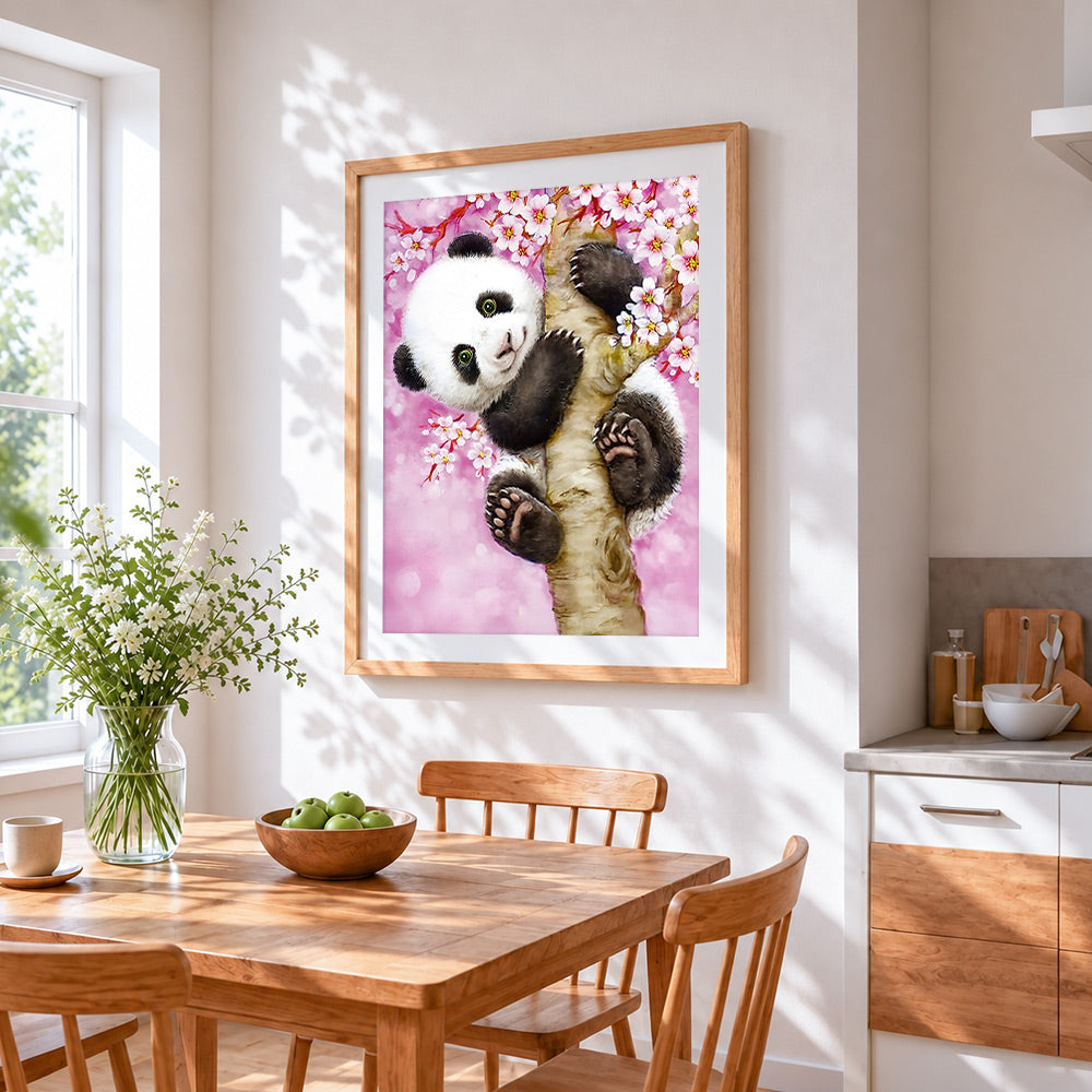 Cute panda in a cherry blossom tree paint by numbers artwork displayed on wall as home decor