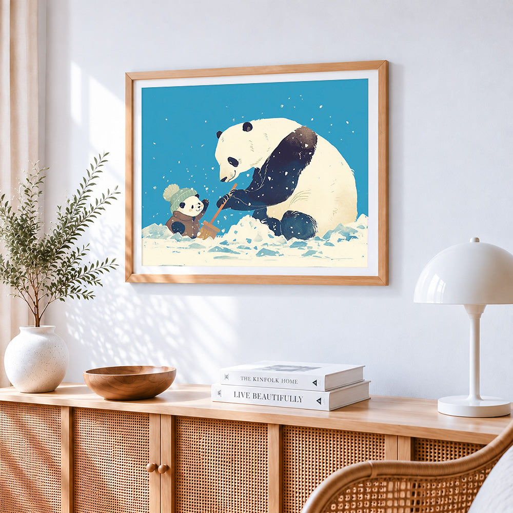 Cute pandas building a snowman cross stitch artwork displayed on wall as home decor