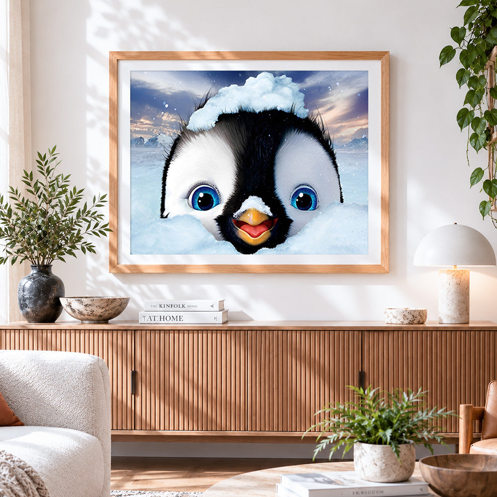 Finished cute penguin in the snow cross stitch artwork displayed