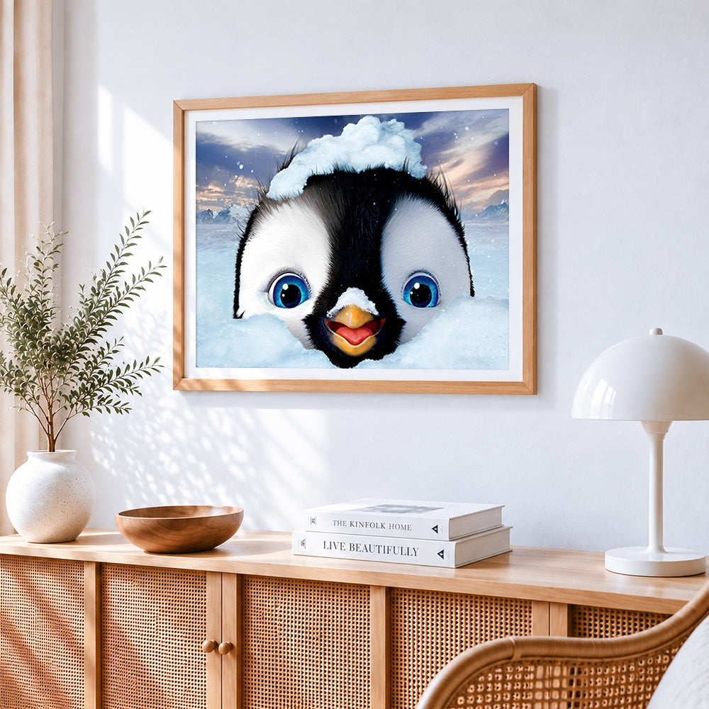 Cute penguin in the snow cross stitch artwork displayed on wall as home decor