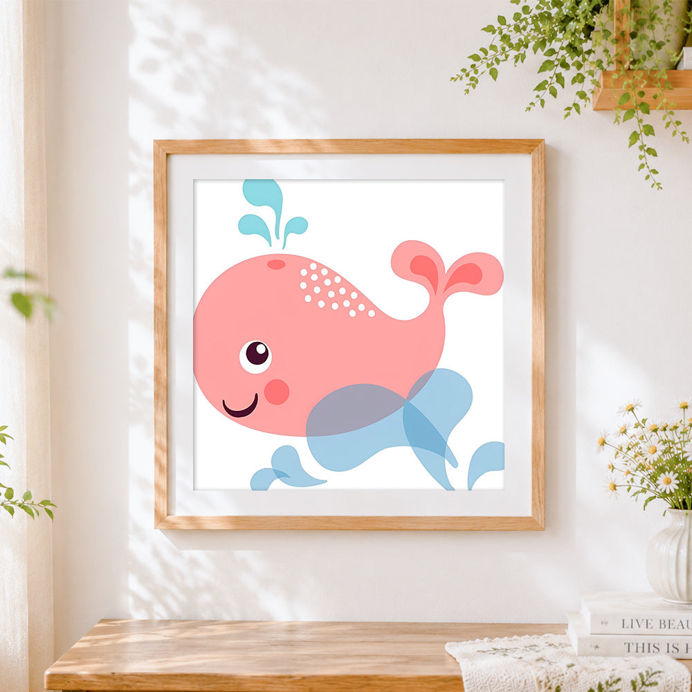 Finished cute pink cartoon whale cross stitch artwork displayed