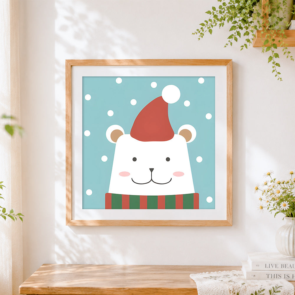 Finished cute polar bear with santa hat cross stitch artwork displayed